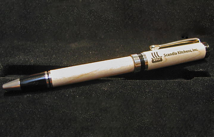 Custom maple pen designed by Mark Ferioli and laser engraved with company logo