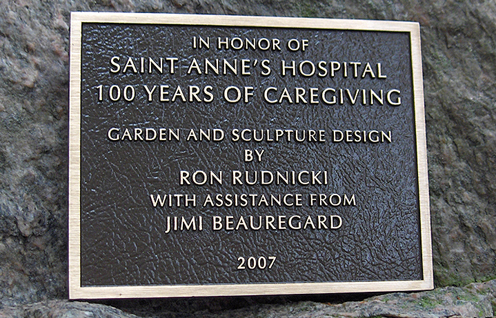 7 in. x 9 in. Bronze dedication plaque with raised letters, dark oxide stain, leatherette background & concealed studs